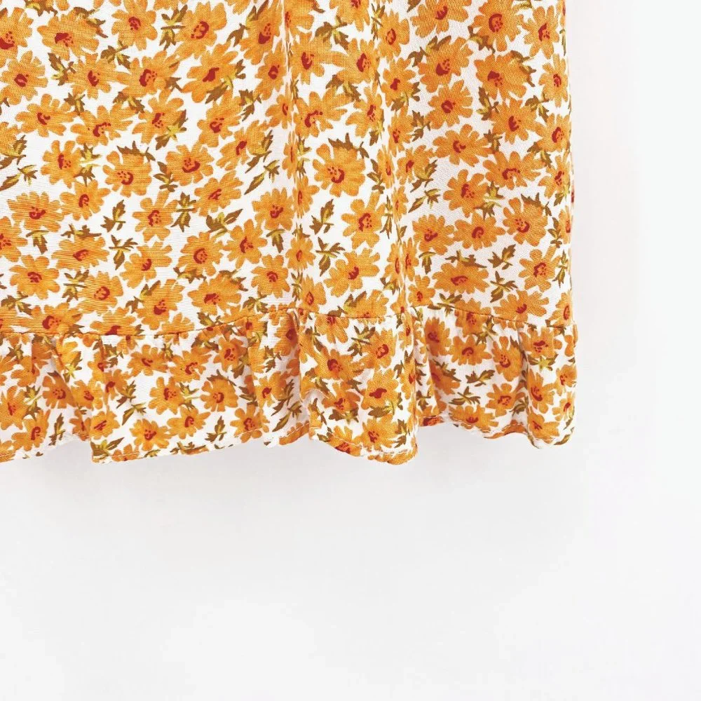 Princess Polly yellow orange